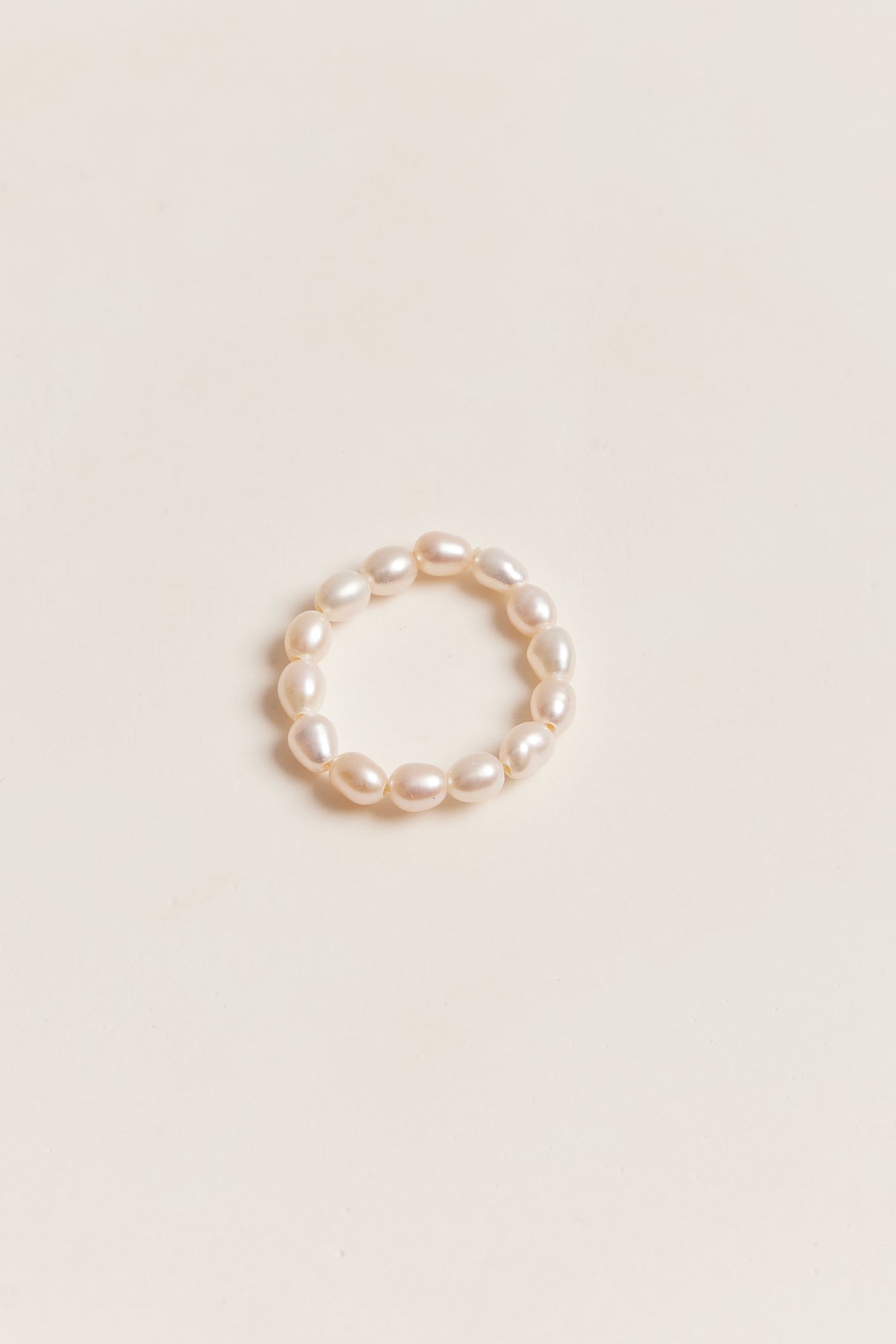 Elastic deals pearl ring